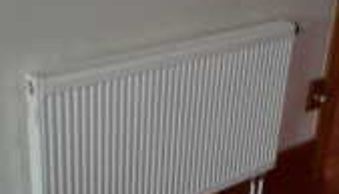 Radiator-install-e1453234121916-169x300